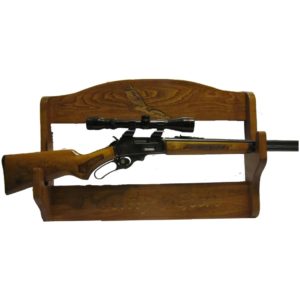 Personalized wooden wall rack deigned to hold a rifle.