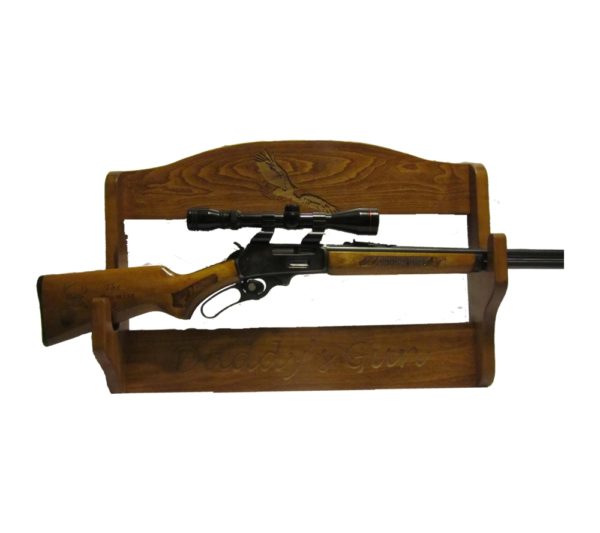 Personalized wooden wall rack deigned to hold a rifle.