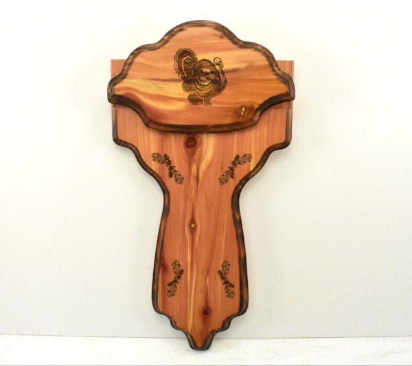 Classic style, two piece turkey plaque with leg slots.