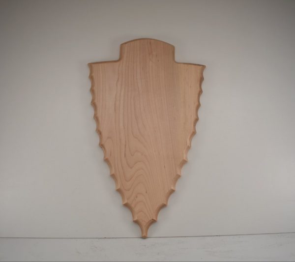 Arrowhead style flat skull plaque.