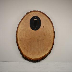 Bark Edge oval plaque with skull hanger.