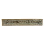 Barnwood door topper sign that reads, "Life Is Better At The Cottage".