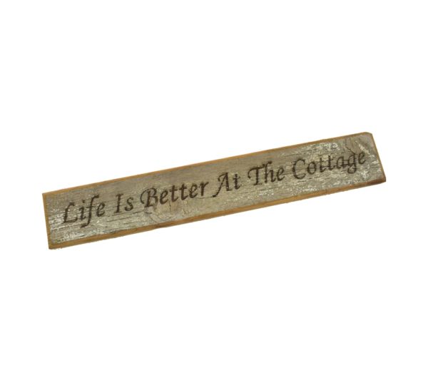 Barnwood door topper sign that reads, "Life Is Better At The Cottage".