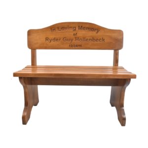 Custom engraved wooden memorial bench.