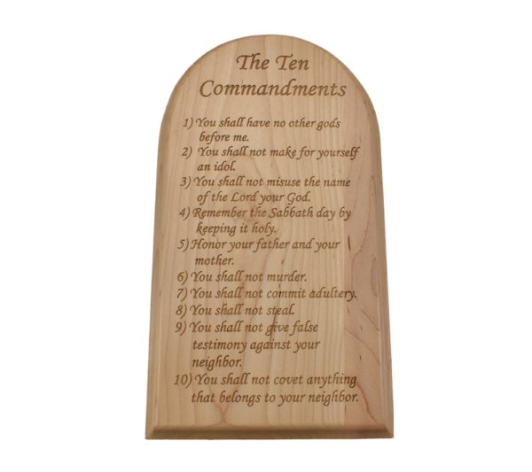 Engraved hardwood sign with an arched top and inscribed with the Ten Commandments.
