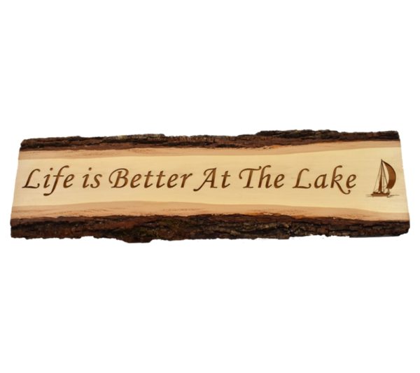 Engraved live edge door topper sign that reads, "Life is Better at the Lake".