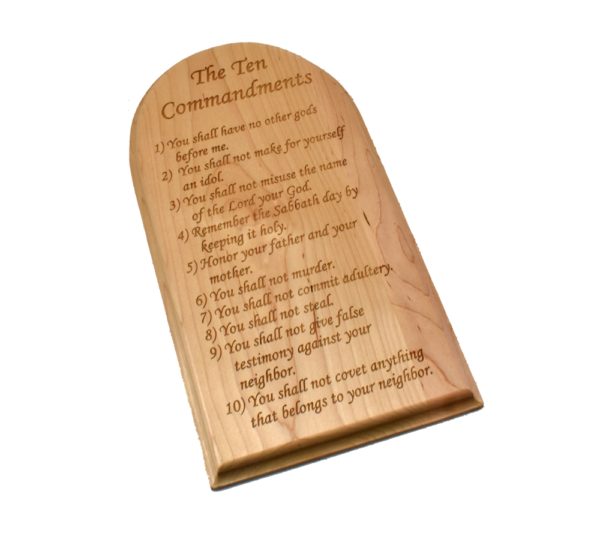 Engraved hardwood sign with an arched top and inscribed with the Ten Commandments.