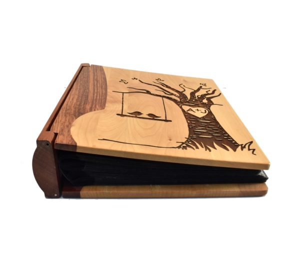 Personalized wooden photo album cover.