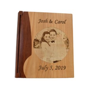 Personalized three ring wooden photo album.