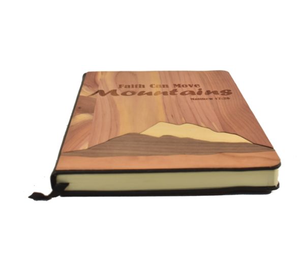 Custom engraved wooden notebook cover.