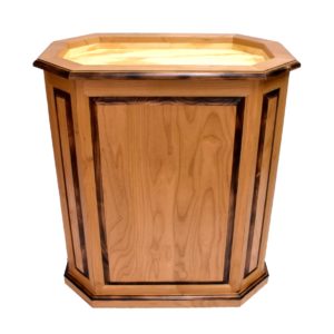 Burned alder octagon pedestal with raised panels, doors.