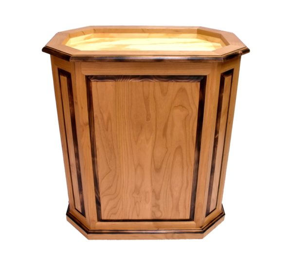 Burned alder octagon pedestal with raised panels, doors.