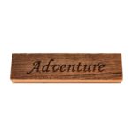 Reclaimed barn wood block sign that reads, "Adventure".