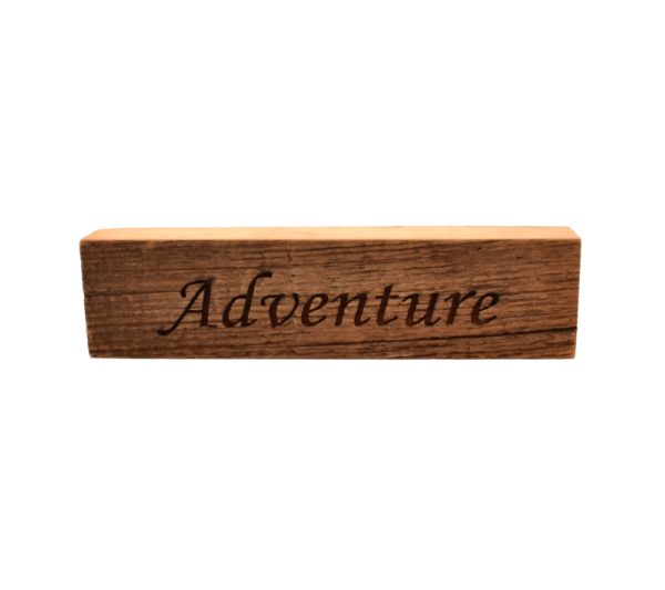 Reclaimed barn wood block sign that reads, "Adventure".