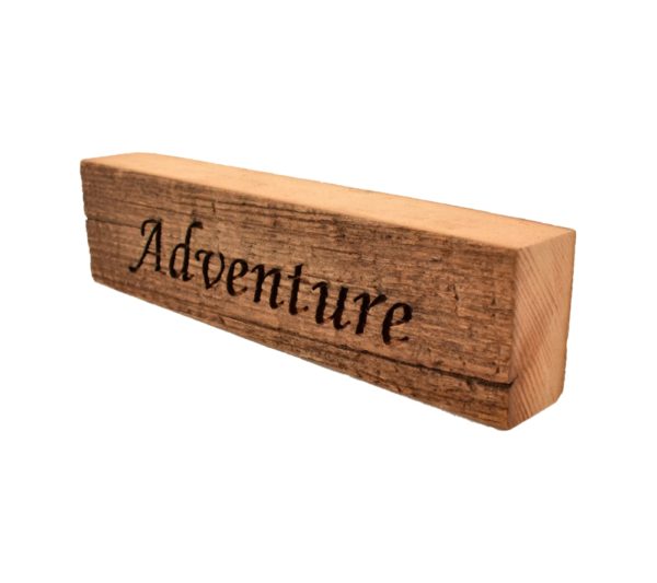 Reclaimed barn wood block sign that reads, "Adventure".