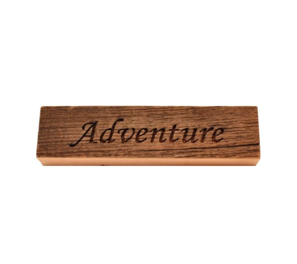 Reclaimed barn wood block sign that reads, "Adventure".