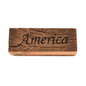 Reclaimed barn wood block sign that reads, "America".