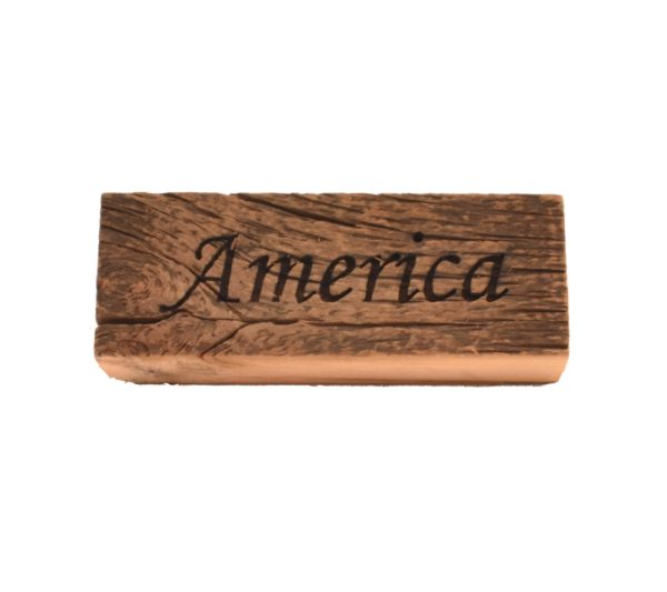Reclaimed barn wood block sign that reads, "America".