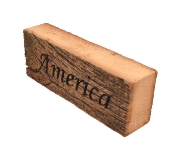 Reclaimed barn wood block sign that reads, "America".