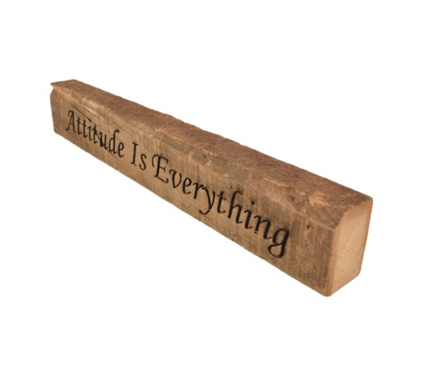 Reclaimed barn wood block sign that reads, "Attitude Is Everything".