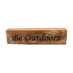 Reclaimed barn wood block sign that reads, "Be Outdoors".