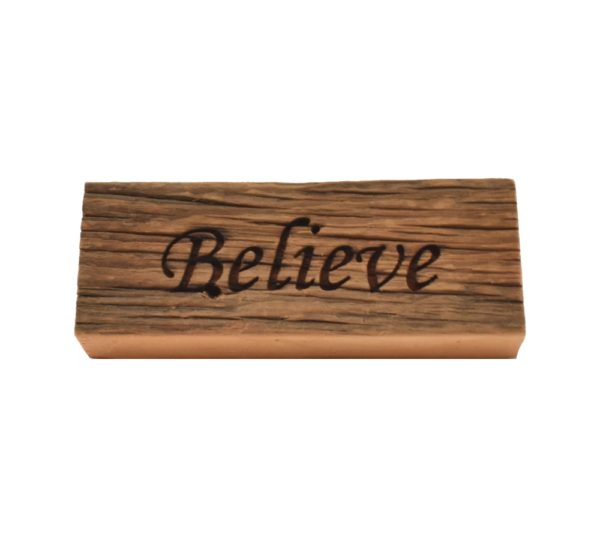 Reclaimed barn wood block sign that reads, "Believe".