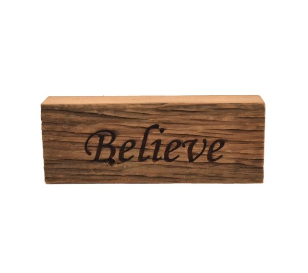 Reclaimed barn wood block sign that reads, "Believe".