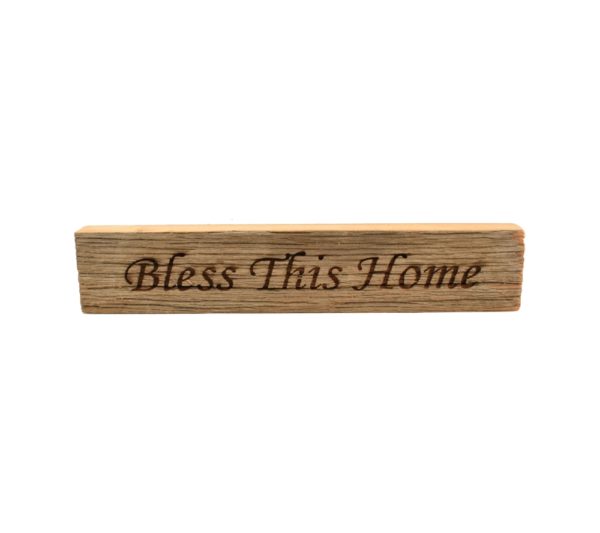 Reclaimed barn wood block sign that reads, "Bless This Home".