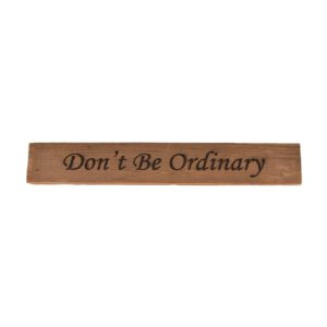 Reclaimed barn wood block sign that reads, "Don't Be Ordinary".