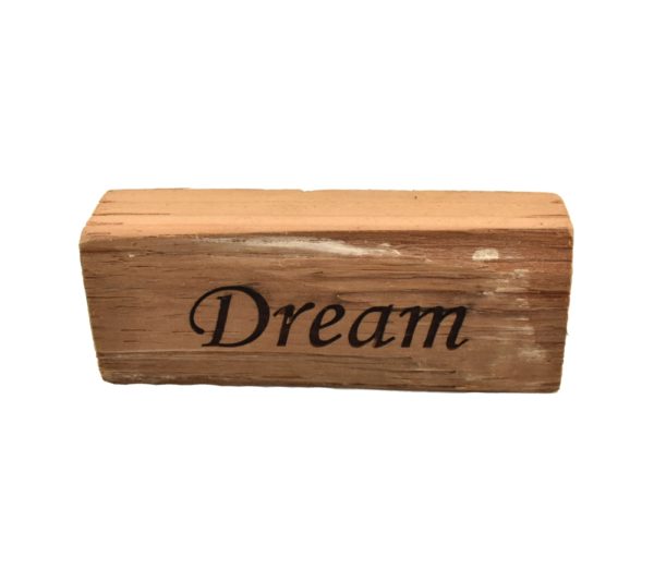 Reclaimed barn wood block sign that reads, "Dream".