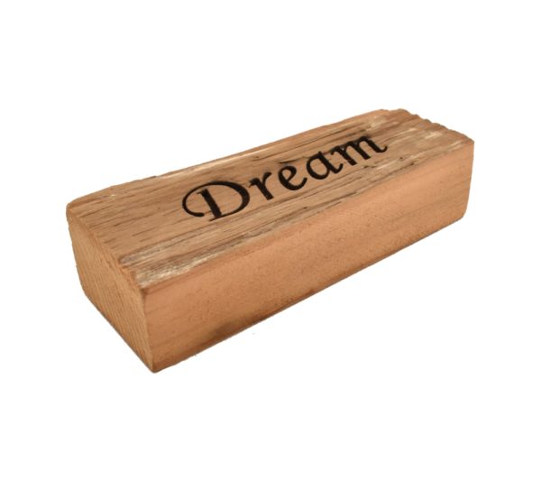 Reclaimed barn wood block sign that reads, "Dream".