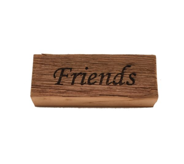 Reclaimed barnwood sign that reads, "Friends".