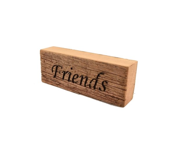 Reclaimed barnwood sign that reads, "Friends".