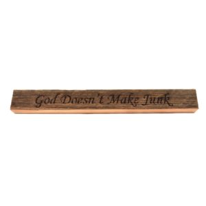 Reclaimed barn wood block sign that reads, "God Doesn't Make Junk".