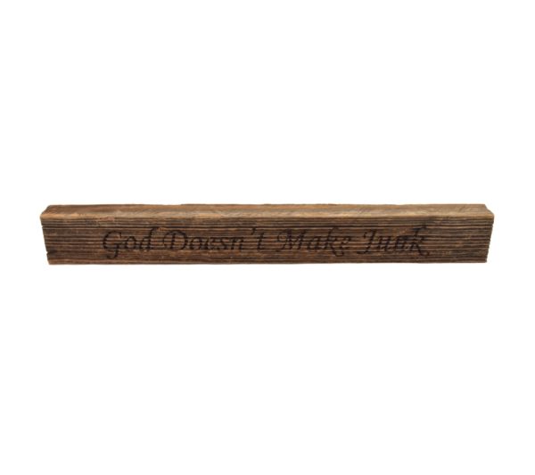 Reclaimed barn wood block sign that reads, "God Doesn't Make Junk".