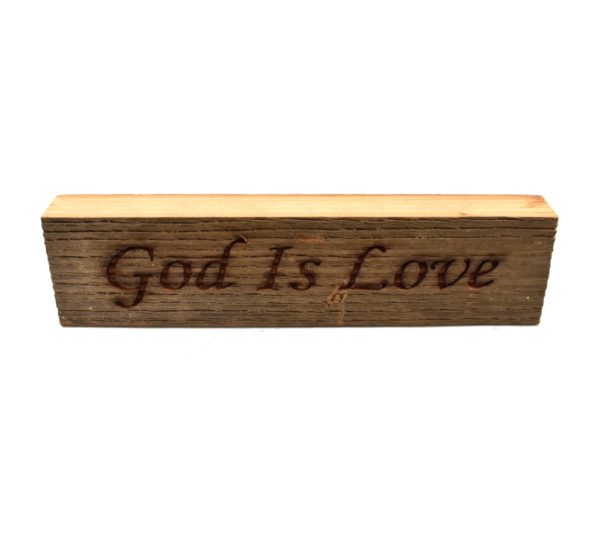Reclaimed barnwood sign that reads, "God Is Love".