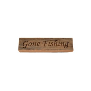 Reclaimed barnwood sign that reads, "Gone Fishing".