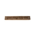 Reclaimed barn wood block sign that reads, "Good Things Take Time".