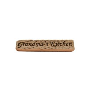 Reclaimed barn wood block sign that reads, "Grandma's Kitchen".