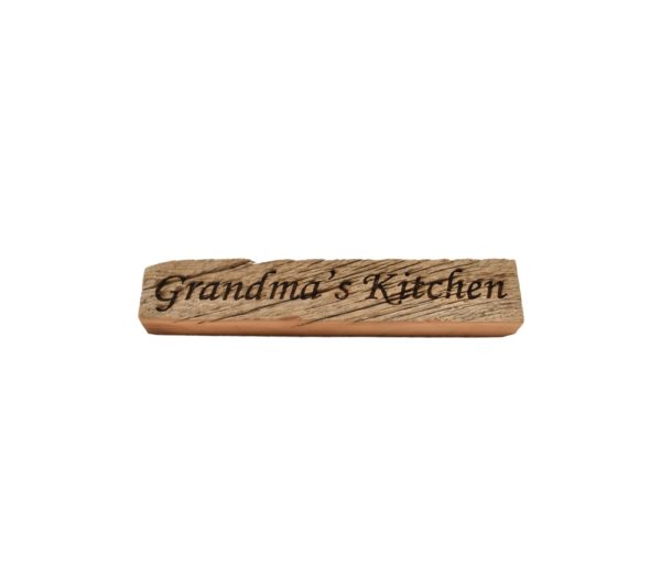 Reclaimed barn wood block sign that reads, "Grandma's Kitchen".