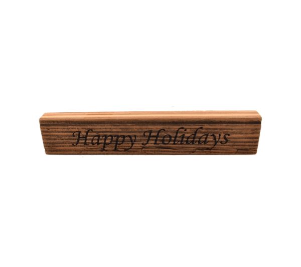 Reclaimed barn wood block sign that reads, "Happy Holidays".