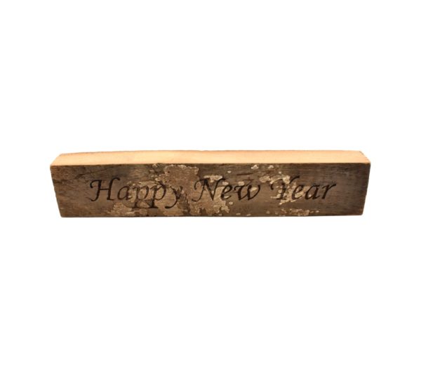 Reclaimed barnwood sign that reads, "Happy New Year".