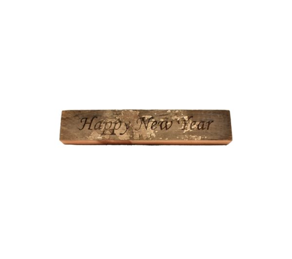 Reclaimed barnwood sign that reads, "Happy New Year".