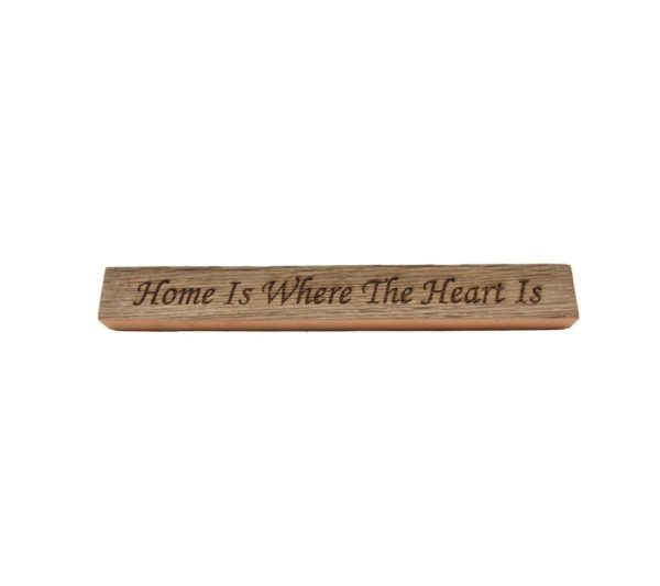 Reclaimed barn wood block sign that reads, "Home Is Where The Heart Is".
