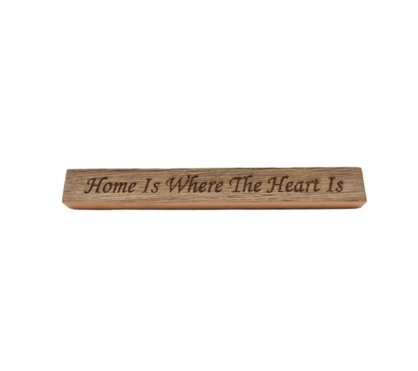 Reclaimed barn wood block sign that reads, "Home Is Where The Heart Is".