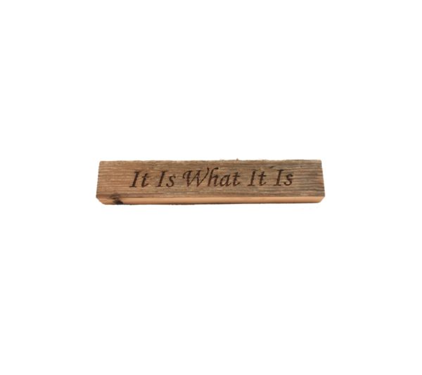 Reclaimed barn wood block sign that reads, "It Is What It Is".