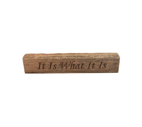 Reclaimed barn wood block sign that reads, "It Is What It Is".