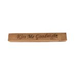 Reclaimed barn wood block sign that reads, "Kiss Me Goodnight".