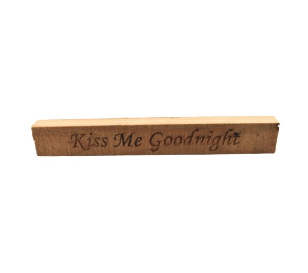 Reclaimed barn wood block sign that reads, "Kiss Me Goodnight".