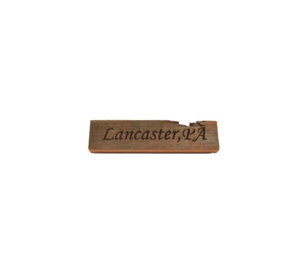 Reclaimed barn wood block sign that reads, "Lancaster, PA".